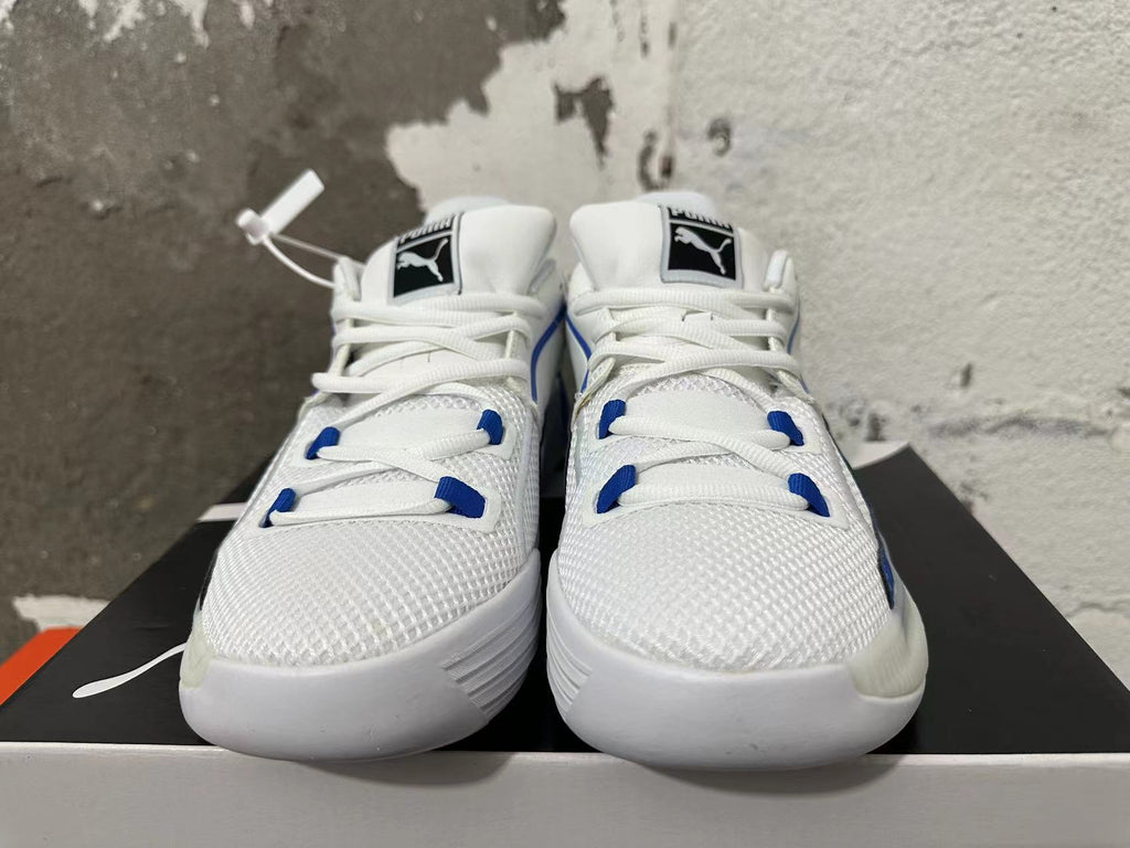 Puma Clyde Sneakers in White and Blue - product image from the listing.