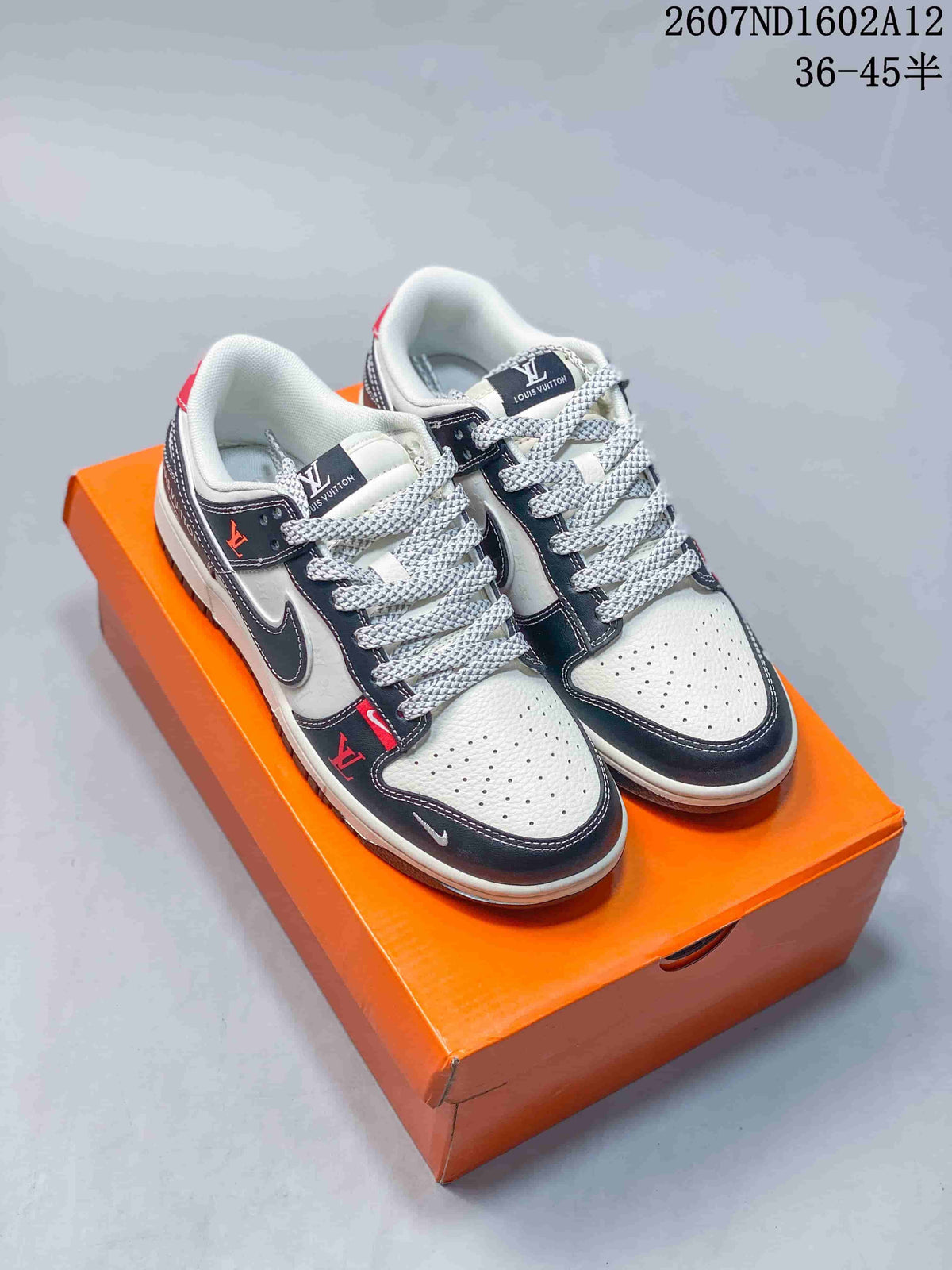 Nike SB Dunk Low Sneakers in Black White Red - product image from the listing.