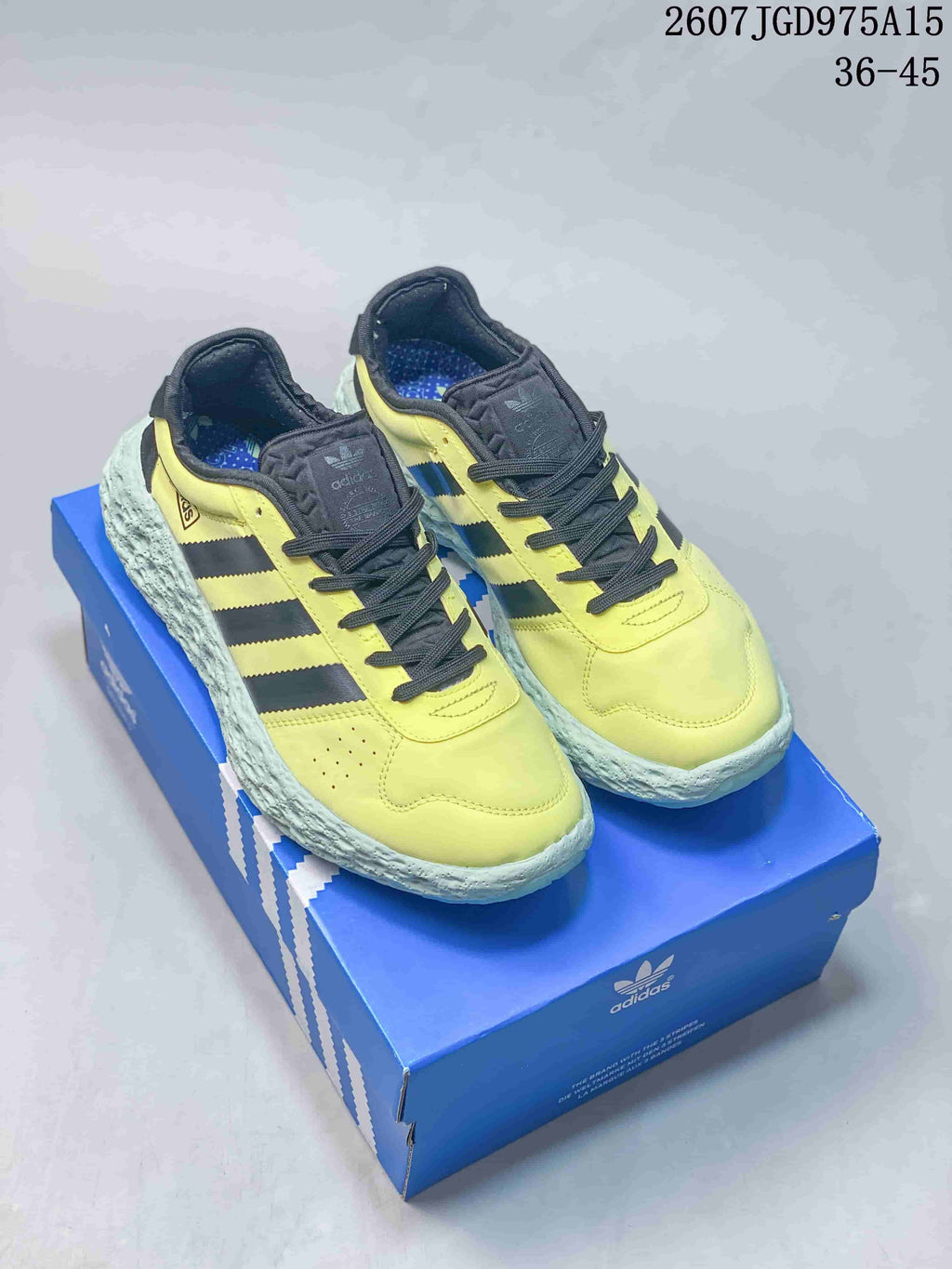 Adidas Zponge Low-Top Sneakers in Yellow Black IH0977 - product image from the listing.