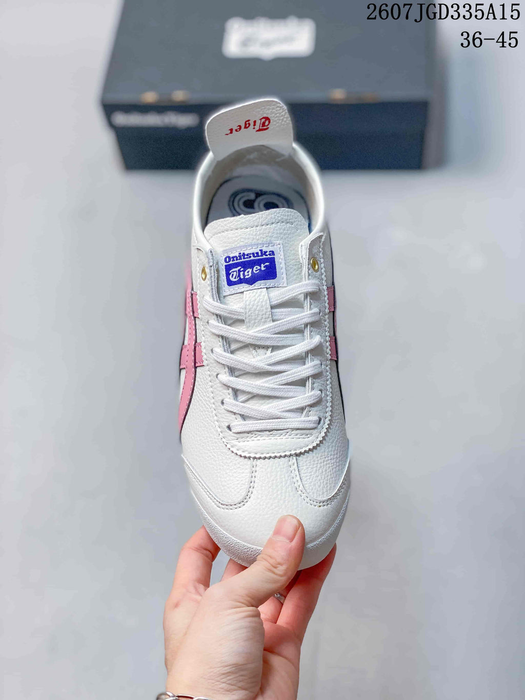 Onitsuka Tiger Mexico 66 Deluxe Sneakers in White Pink 2607JGD335A15 - product image from the listing.