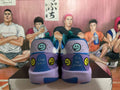 Nike Crooked-Smile Face Basketball Sneakers in Purple and Teal - product image from the listing.