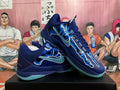 Nike Kobe 5 Basketball Shoes in Blue - product image from the listing.