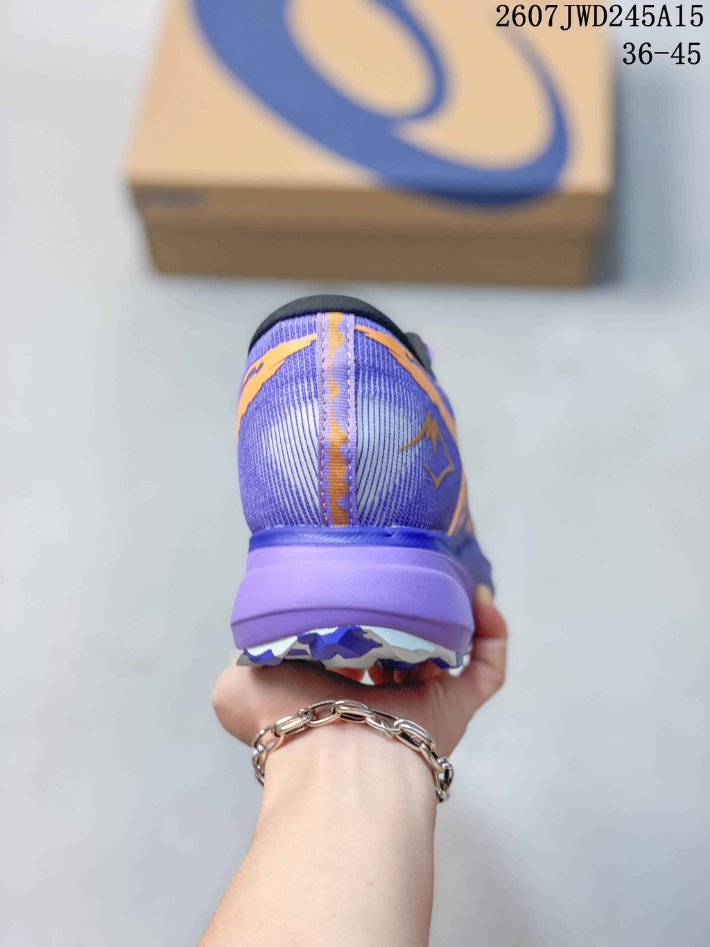 ASICS GEL Magic Speed 4 Sneakers in Purple Orange 2607JWD245A15 - product image from the listing.
