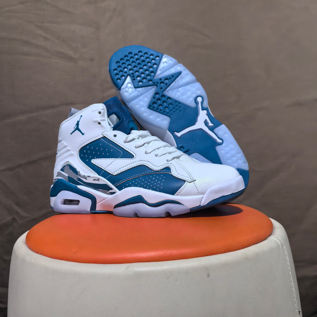 Jordan 6 Retro High-Top Sneakers in White and Blue - product image from the listing.