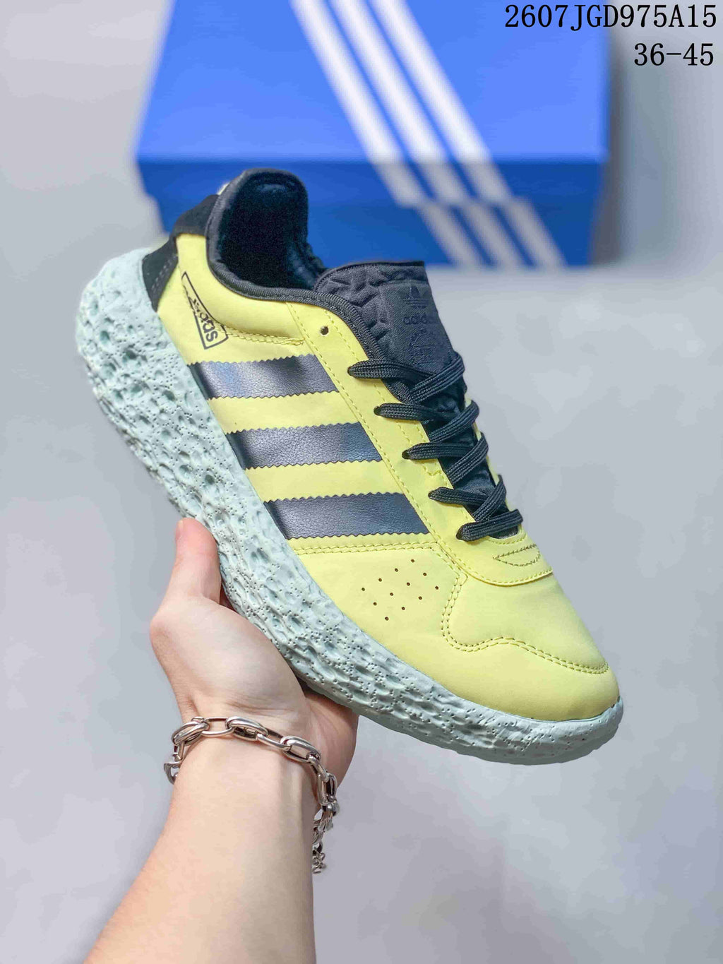 Adidas Zponge Low-Top Sneakers in Yellow Black IH0977 - product image from the listing.