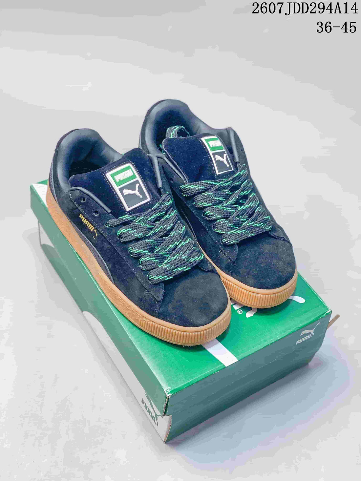 PUMA Suede XL Low-Top Sneakers in Black and Gum - product image from the listing.