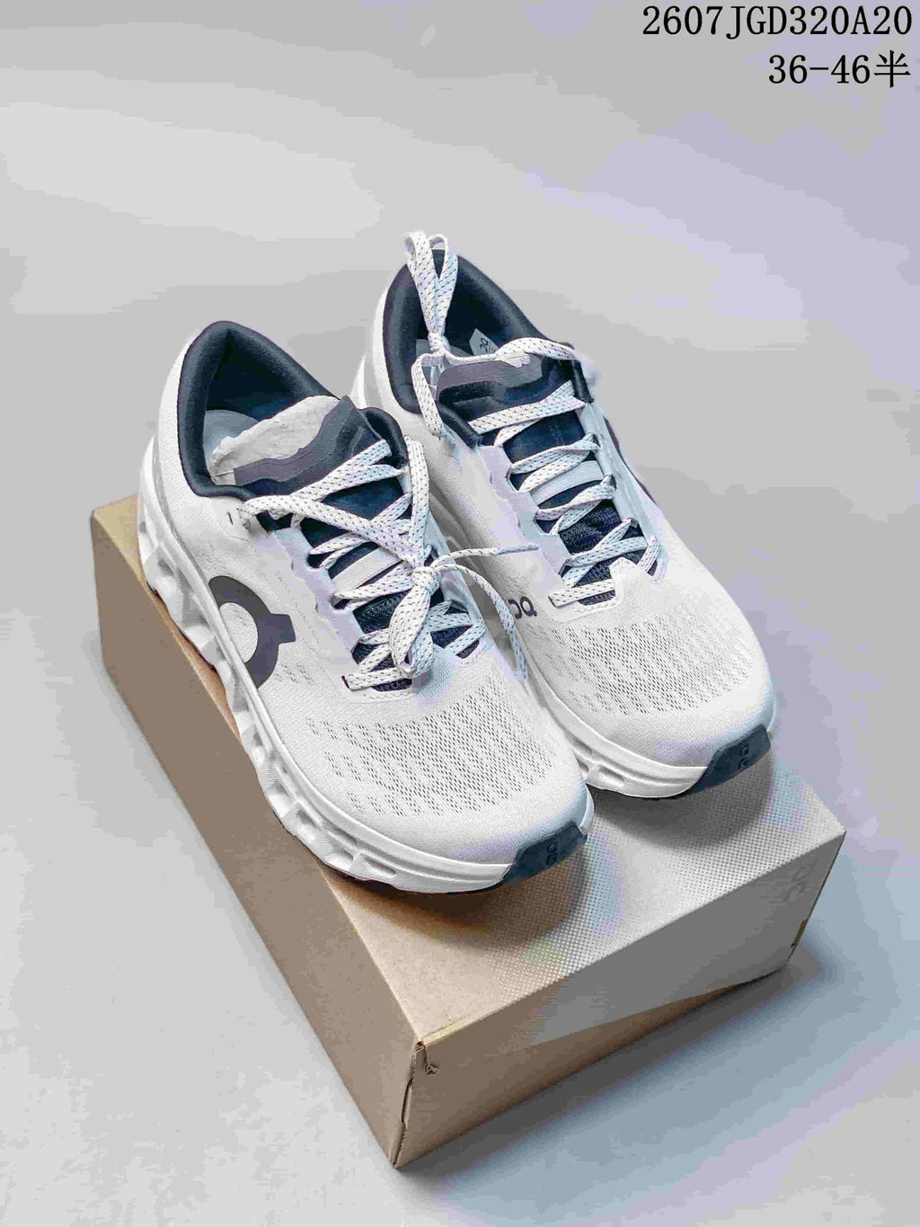 On Cloudmonster 3 Running Sneakers in White Black 2607JGD320A20 - product image from the listing.