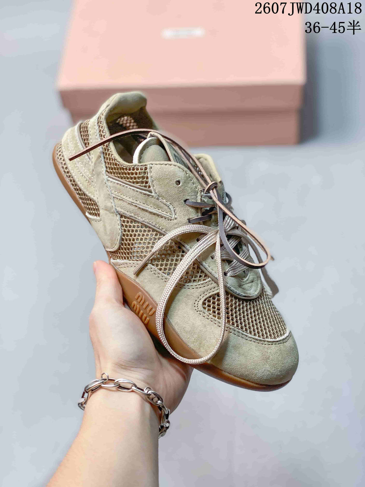 Miu Miu Gymnasium Low-Cut Sneakers Beige Sage 2607JWD408A18 - product image from the listing.
