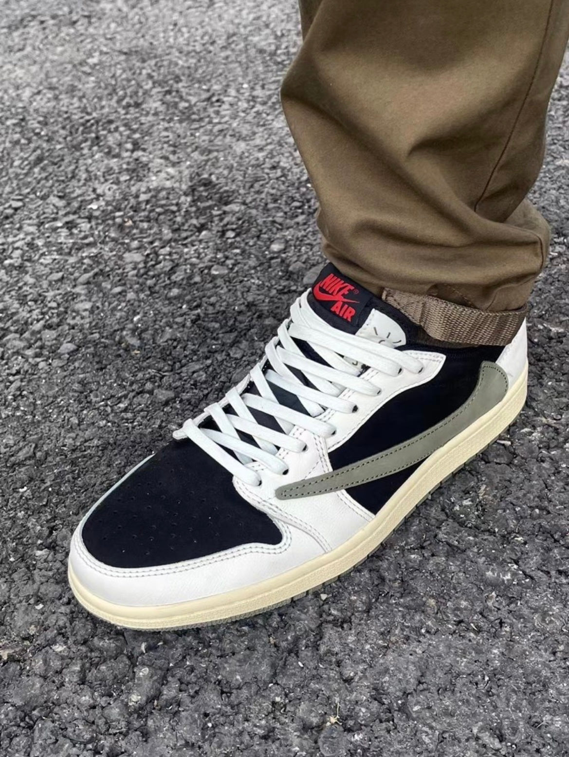 Nike Air Jordan 1 Low Travis Scott Sneakers in Olive DZ4137-106 - product image from the listing.