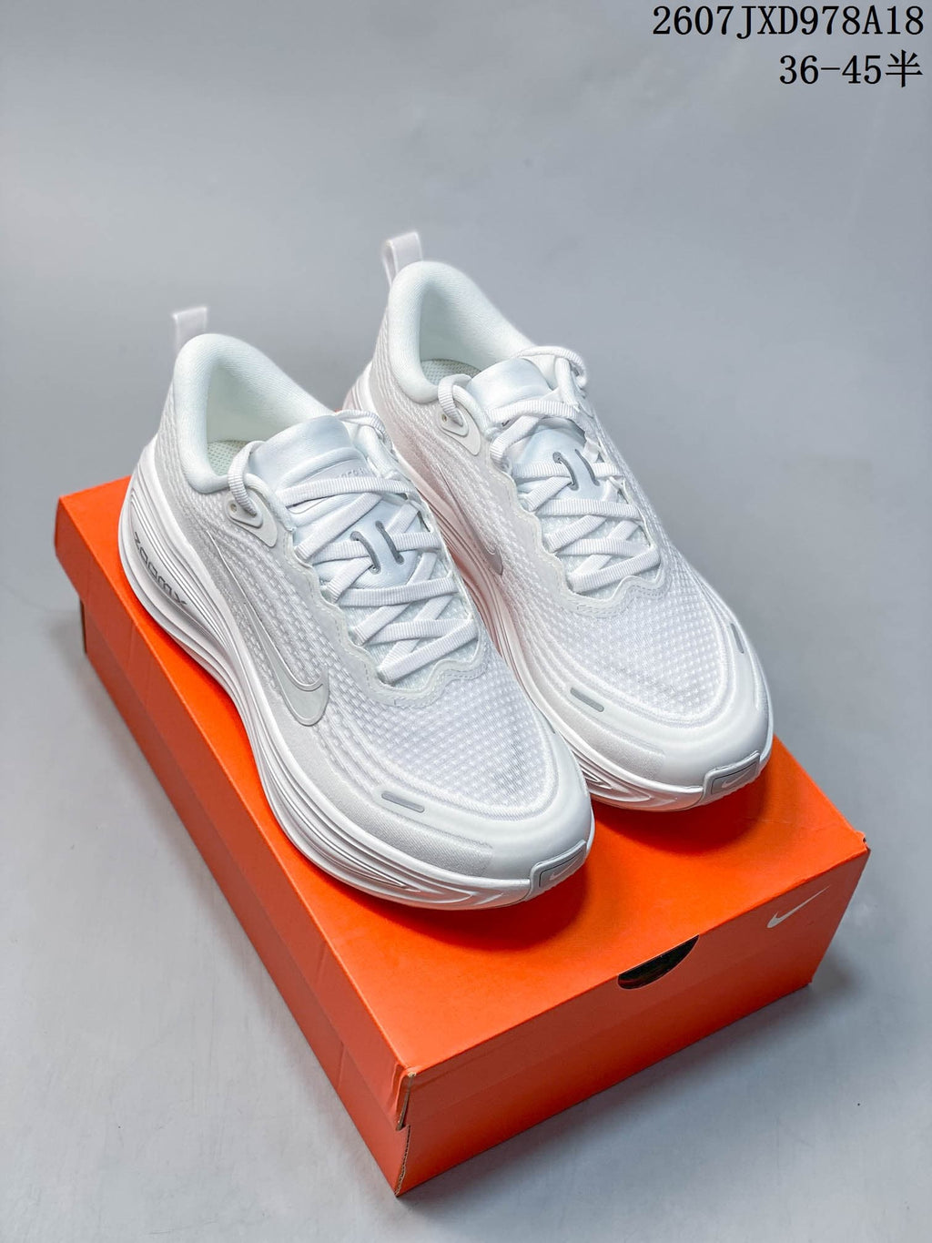 Nike Vomero Plus Running Shoes in White JXD978A18 - product image from the listing.