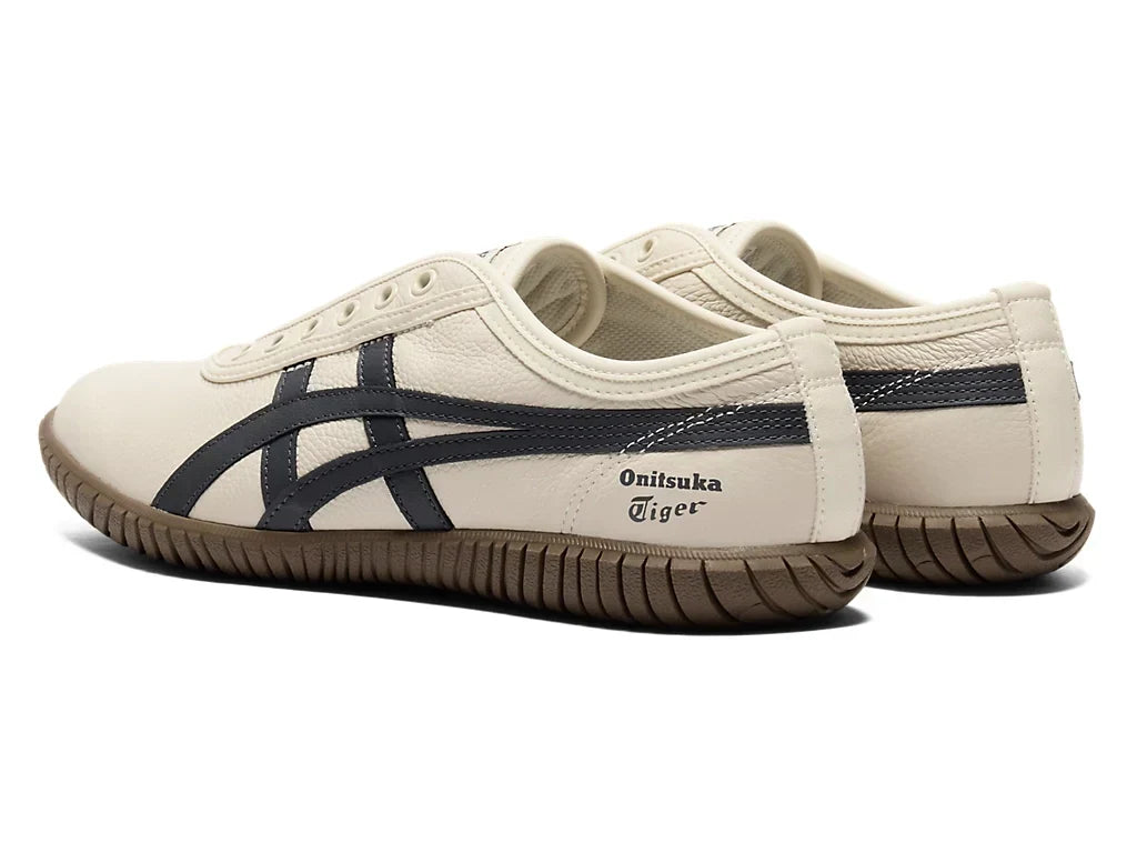 Birch Indigo Navy | 1183C529 200 - Onitsuka Tiger Tsunahiki Slip-On Sneakers - product image from the listing.
