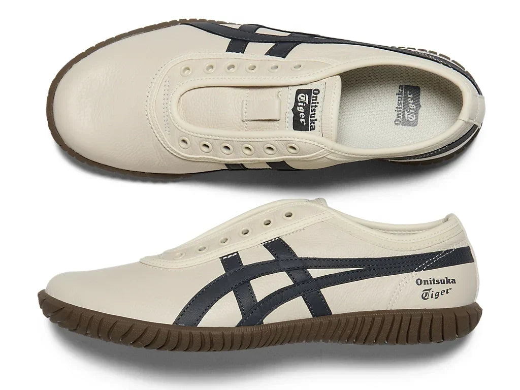 Birch Indigo Navy | 1183C529 200 - Onitsuka Tiger Tsunahiki Slip-On Sneakers - product image from the listing.