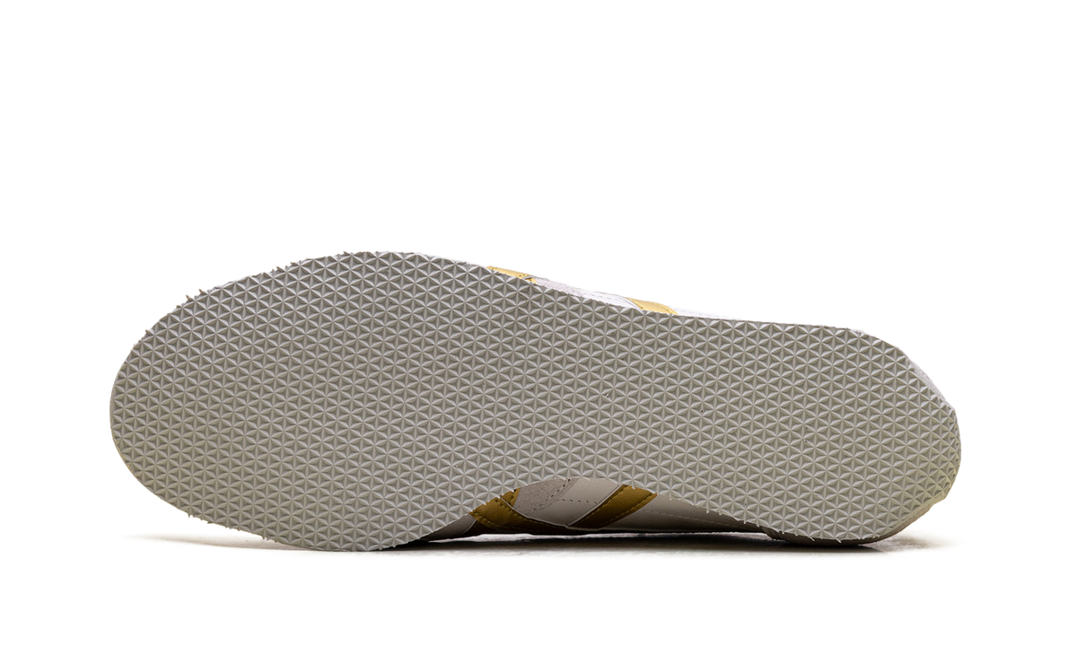 Onitsuka Tiger Runspark Sneakers in Gold - product image from the listing.