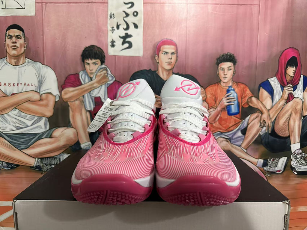 Magenta and White Nike Basketball Shoes - product image from the listing.