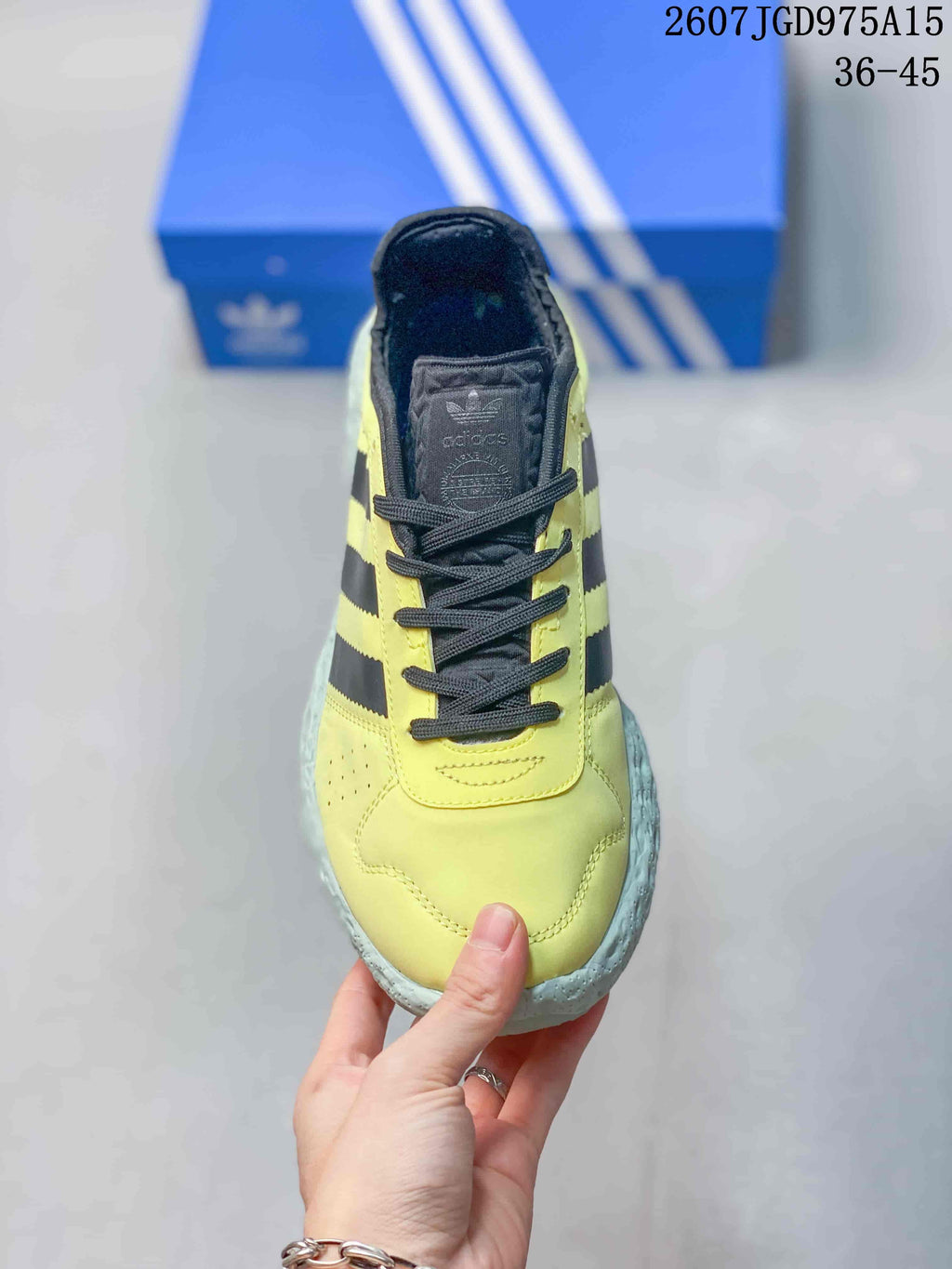 Adidas Zponge Low-Top Sneakers in Yellow Black IH0977 - product image from the listing.