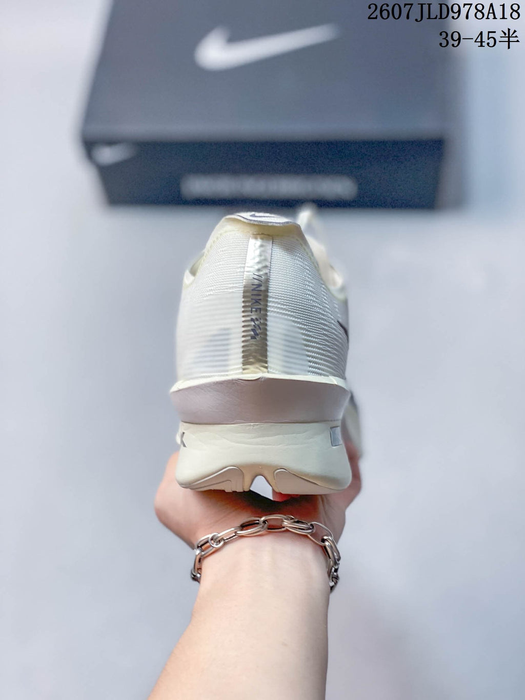 White Nike ZoomX Vaporfly NEXT% 4 Running Shoes - product image from the listing.