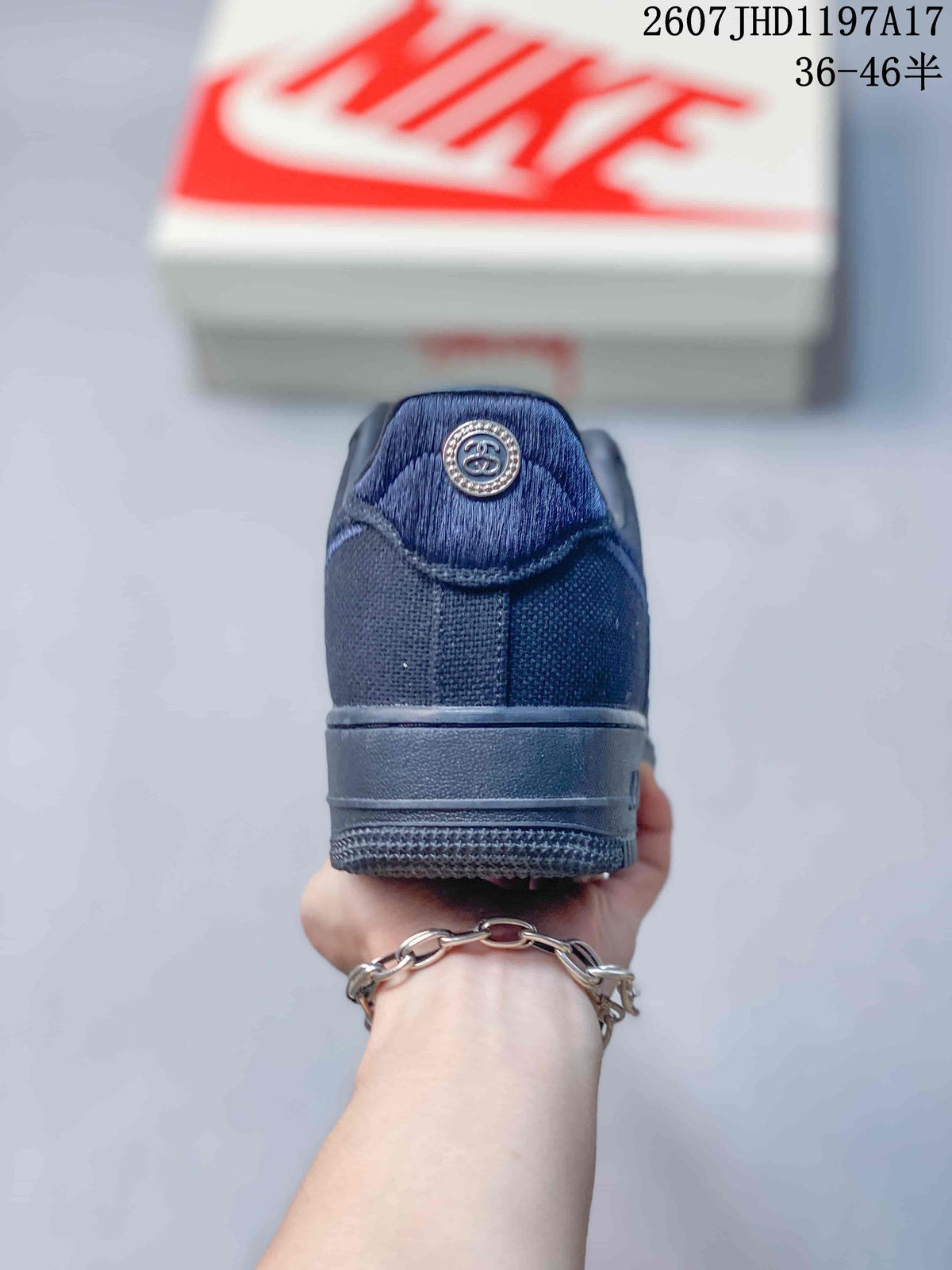 Nike Air Force 1 '07 x Stussy Sneakers in Black 2607JHD1197A17 - product image from the listing.