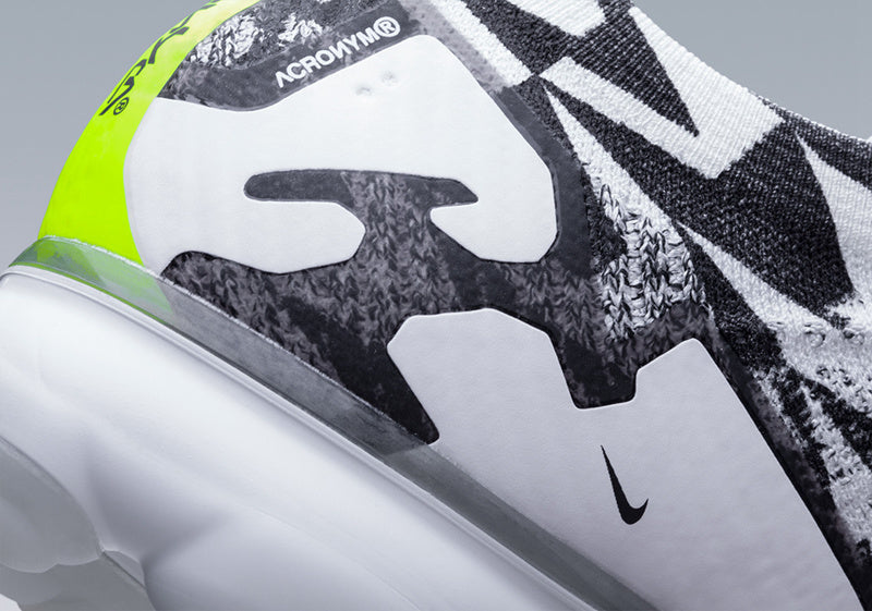Nike Air VaporMax Moc 2 Acronym in Black White Volt AQ0996-001 - product image from the listing.