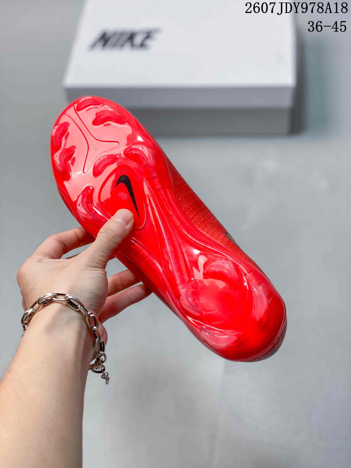 Nike Mercurial Vapor 16 Elite AG-Pro Soccer Cleats in Red - product image from the listing.