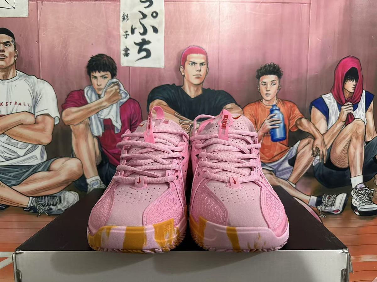 Pink and Gold Nike Basketball Shoes - product image from the listing.