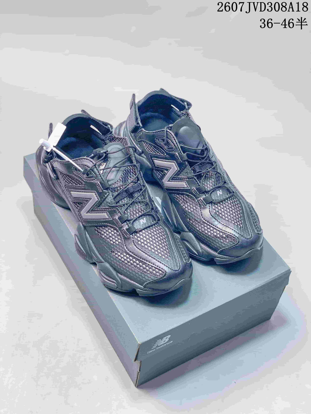 New Balance 9060 Sneakers in Black and White 2607JVD308A18 - product image from the listing.