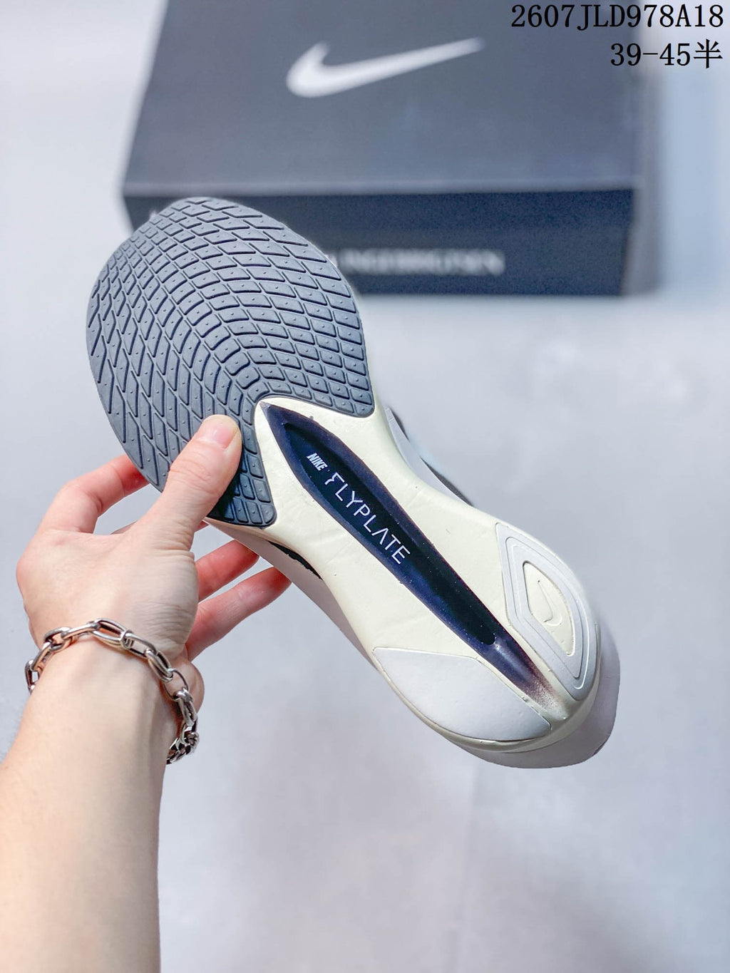 White Nike ZoomX Vaporfly NEXT% 4 Running Shoes - product image from the listing.