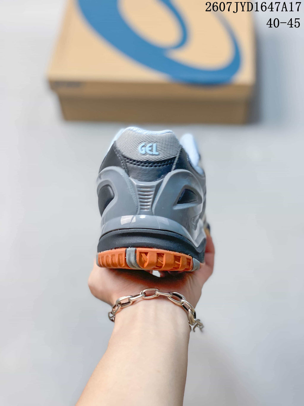 ASICS GEL-Resolution 5 Tennis Shoes in Gray Black Orange - product image from the listing.