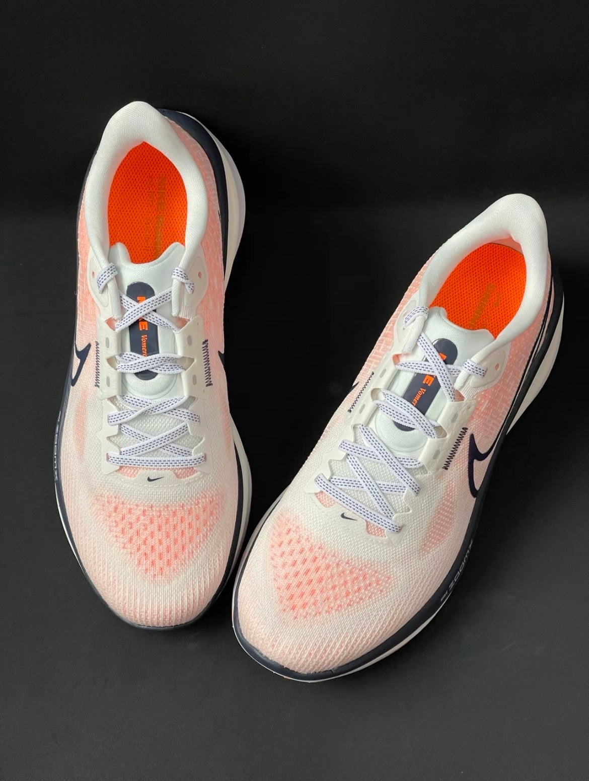 Nike Air Zoom Vomero 17 Running Shoes in White Orange FB1309-102 - product image from the listing.