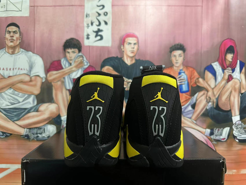 Jordan 14 Retro High-Top Sneakers in Black and Yellow - product image from the listing.