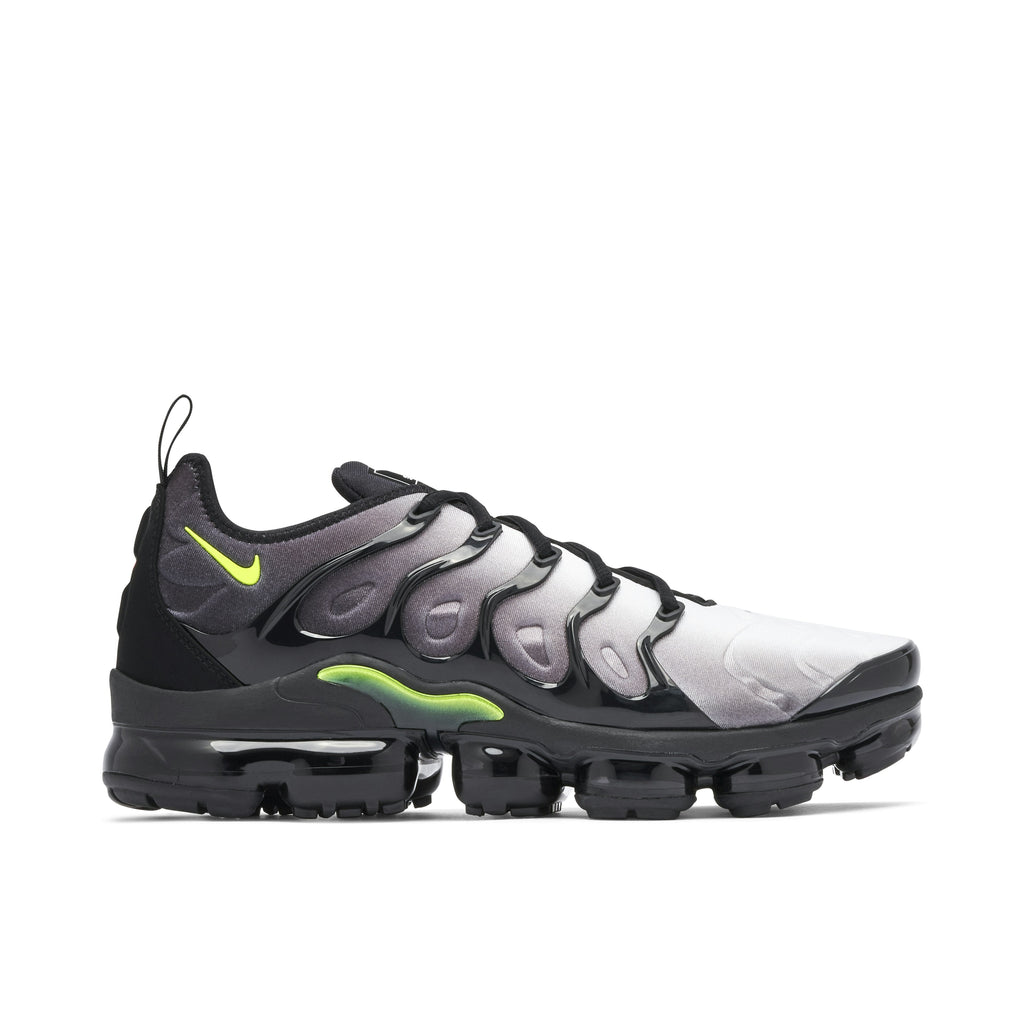 NIKE AIR VAPORMAX PLUS in BLACK VOLT - product image from the listing.