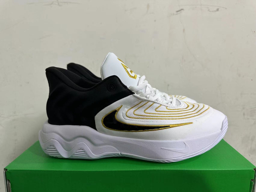 Nike G.T. Cut Academy Basketball Shoes in White Black Gold - product image from the listing.