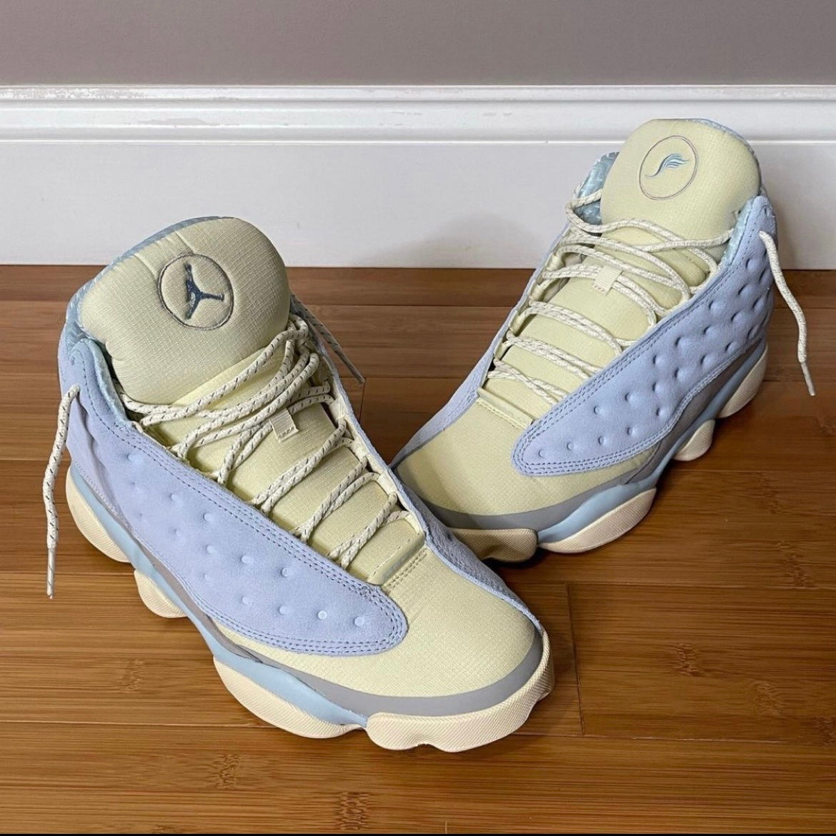 Blue and Cream Jordan 13 SoleFly DX5763-100 Sneakers - product image from the listing.
