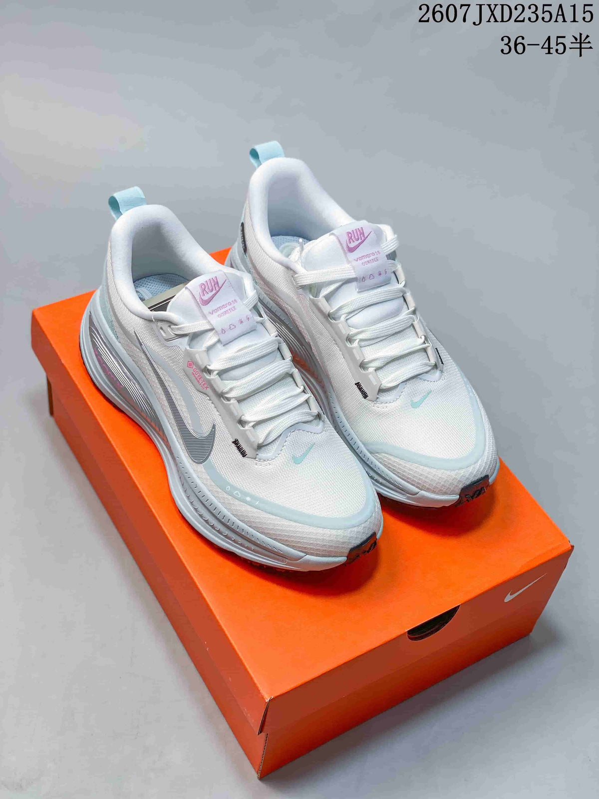 Nike Air Zoom Vomero 18 GTX Running Shoes in White Light Blue - product image from the listing.