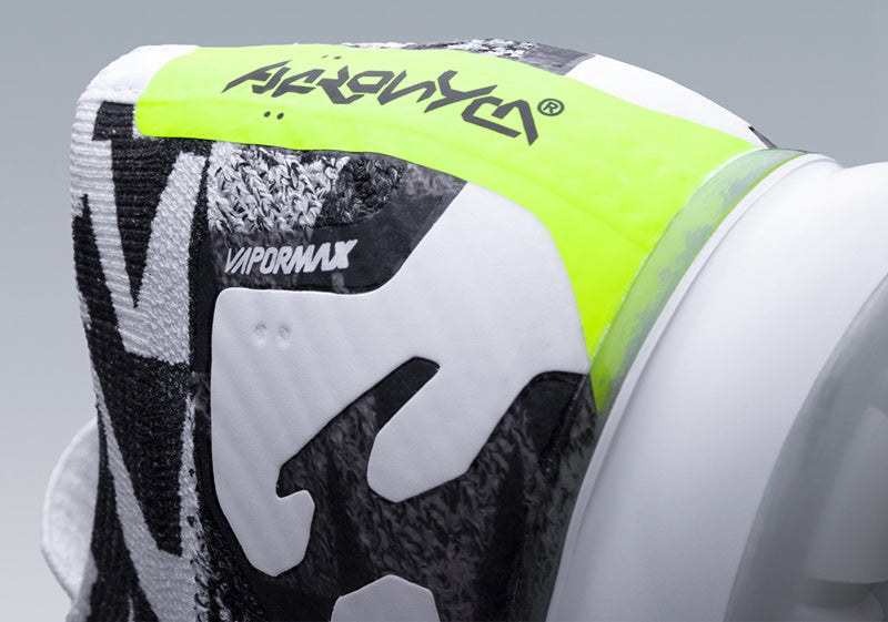 Nike Air VaporMax Moc 2 Acronym in Black White Volt AQ0996-001 - product image from the listing.