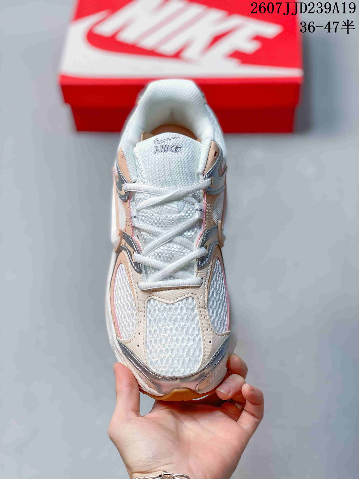 Nike V5 RNR Running Shoes in White Peach Silver 711190RRY - product image from the listing.