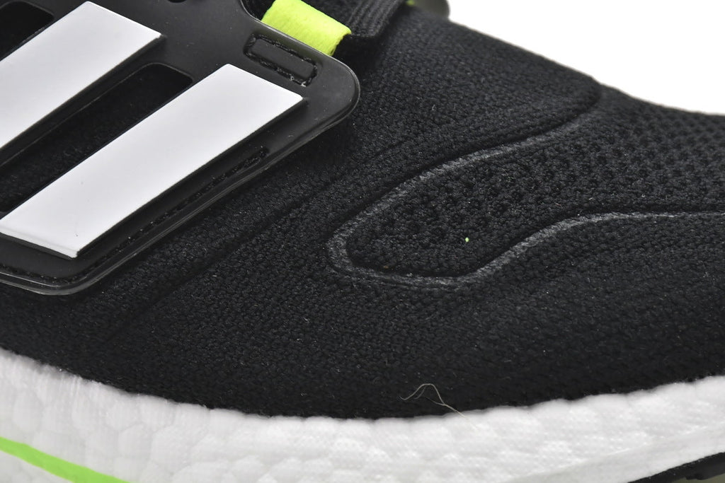 adidas UltraBoost 22 Black Solar Running Shoes in Green GX6640 - product image from the listing.