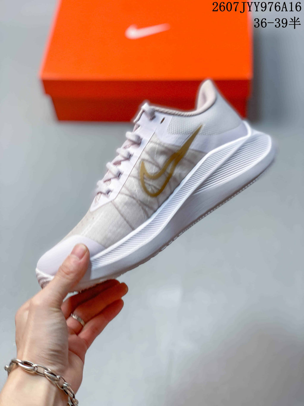 Women's Nike Zoom Winflo 8 Running Sneakers White Gold - product image from the listing.