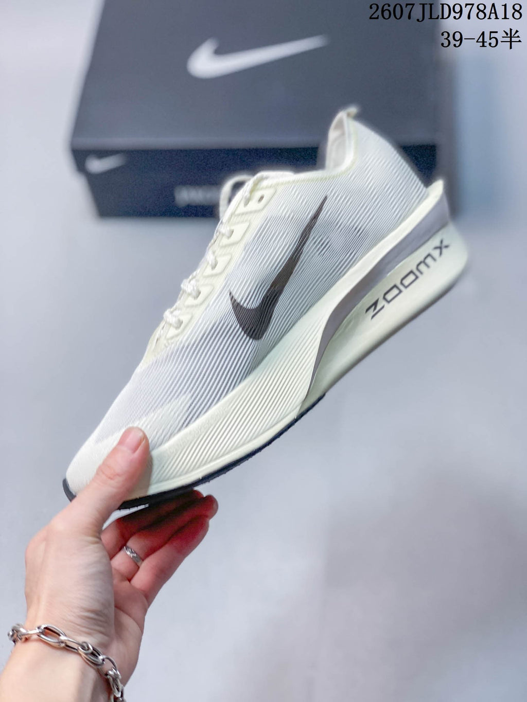 White Nike ZoomX Vaporfly NEXT% 4 Running Shoes - product image from the listing.