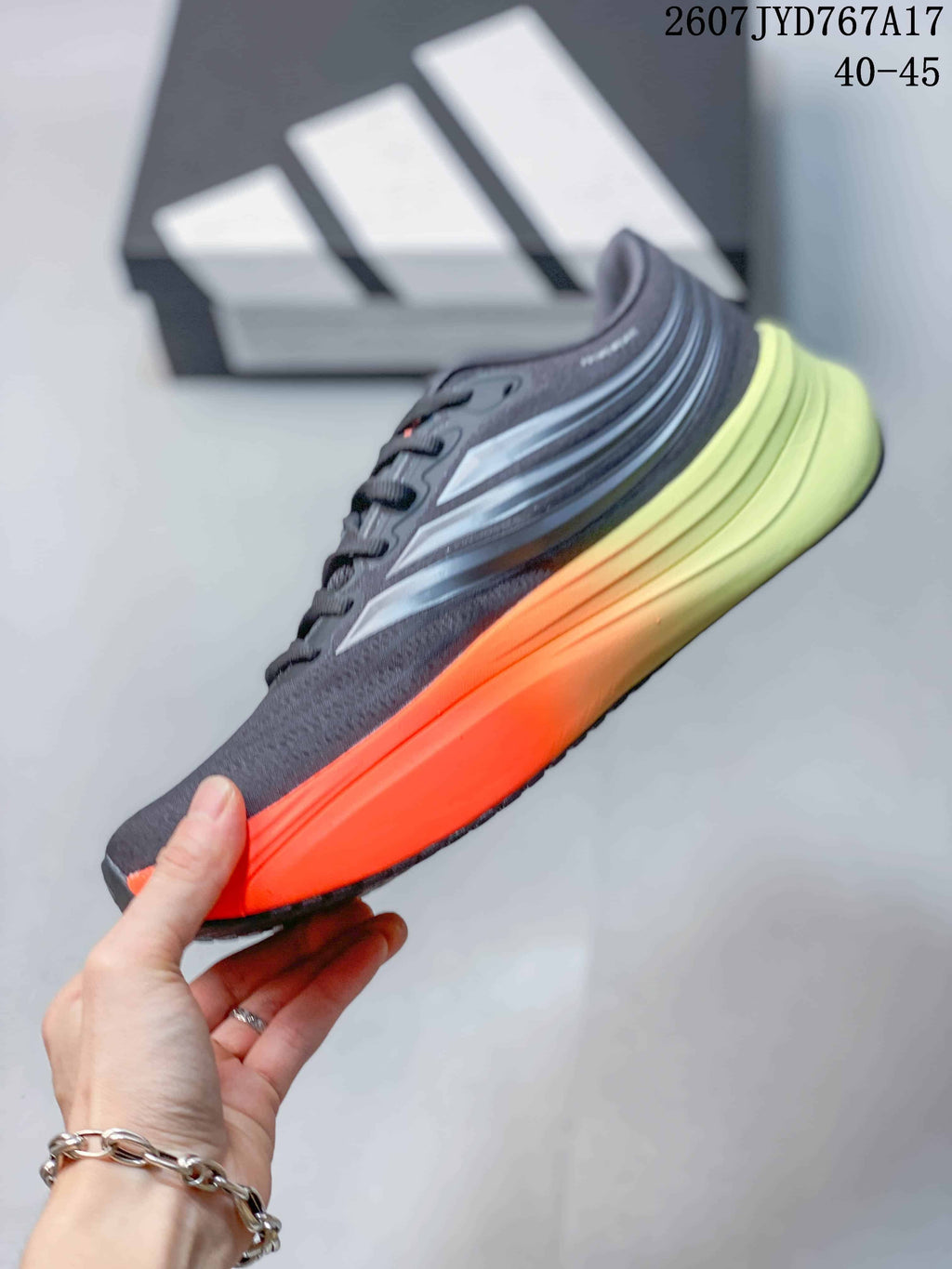 Adidas Supernova Rise Running Shoes in Dark Gray Orange 711570YWI - product image from the listing.