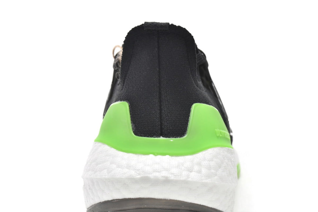 adidas UltraBoost 22 Black Solar Running Shoes in Green GX6640 - product image from the listing.