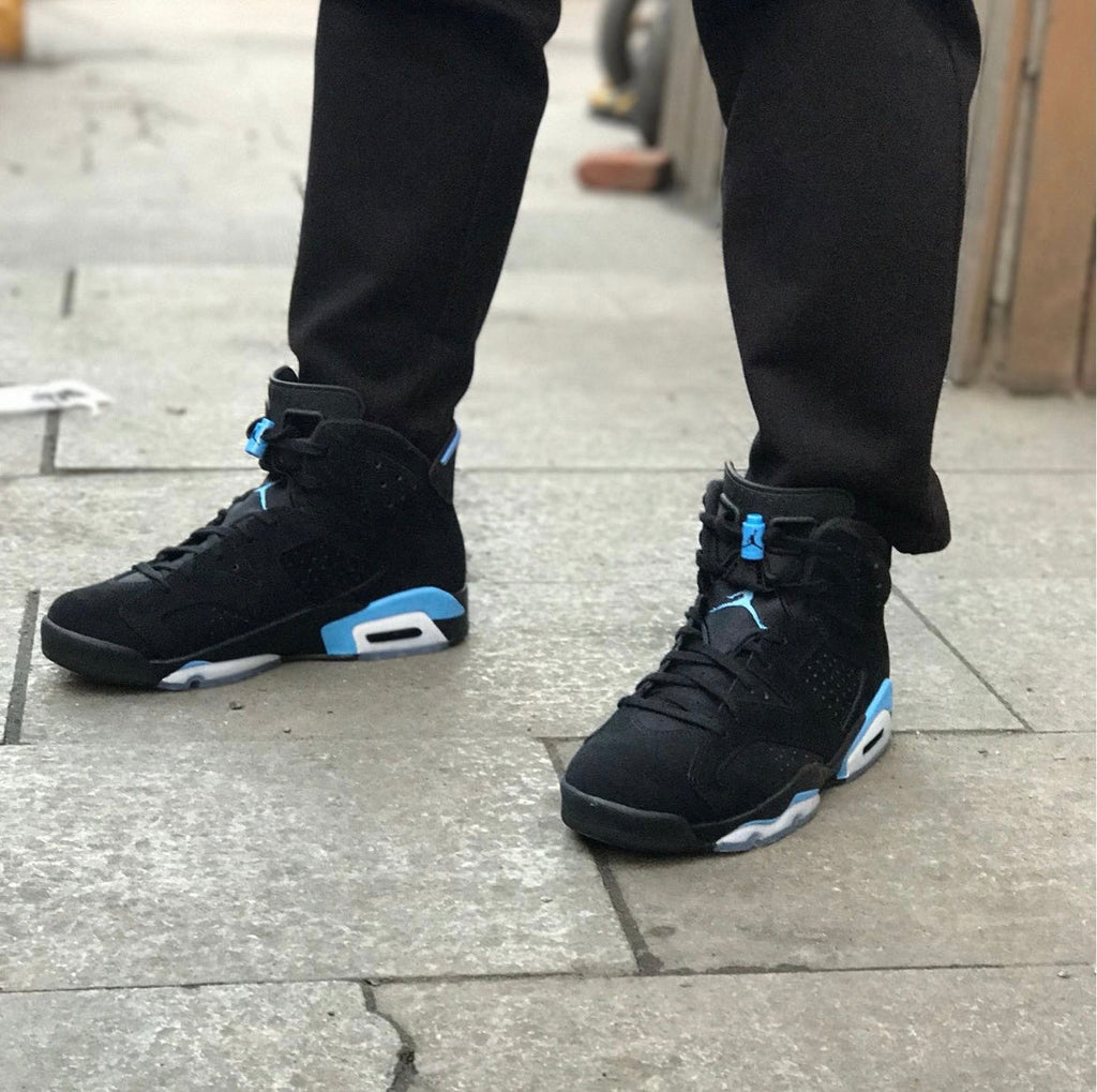 Air Jordan 6 UNC Black and University Blue Sneakers - product image from the listing.