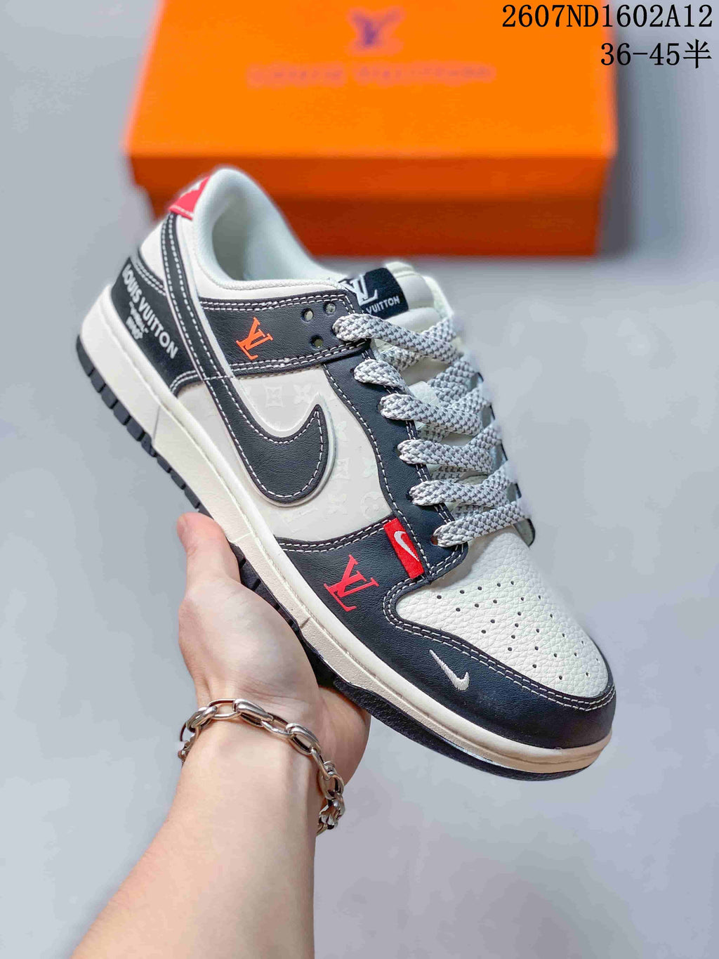 Nike SB Dunk Low Sneakers in Black White Red - product image from the listing.