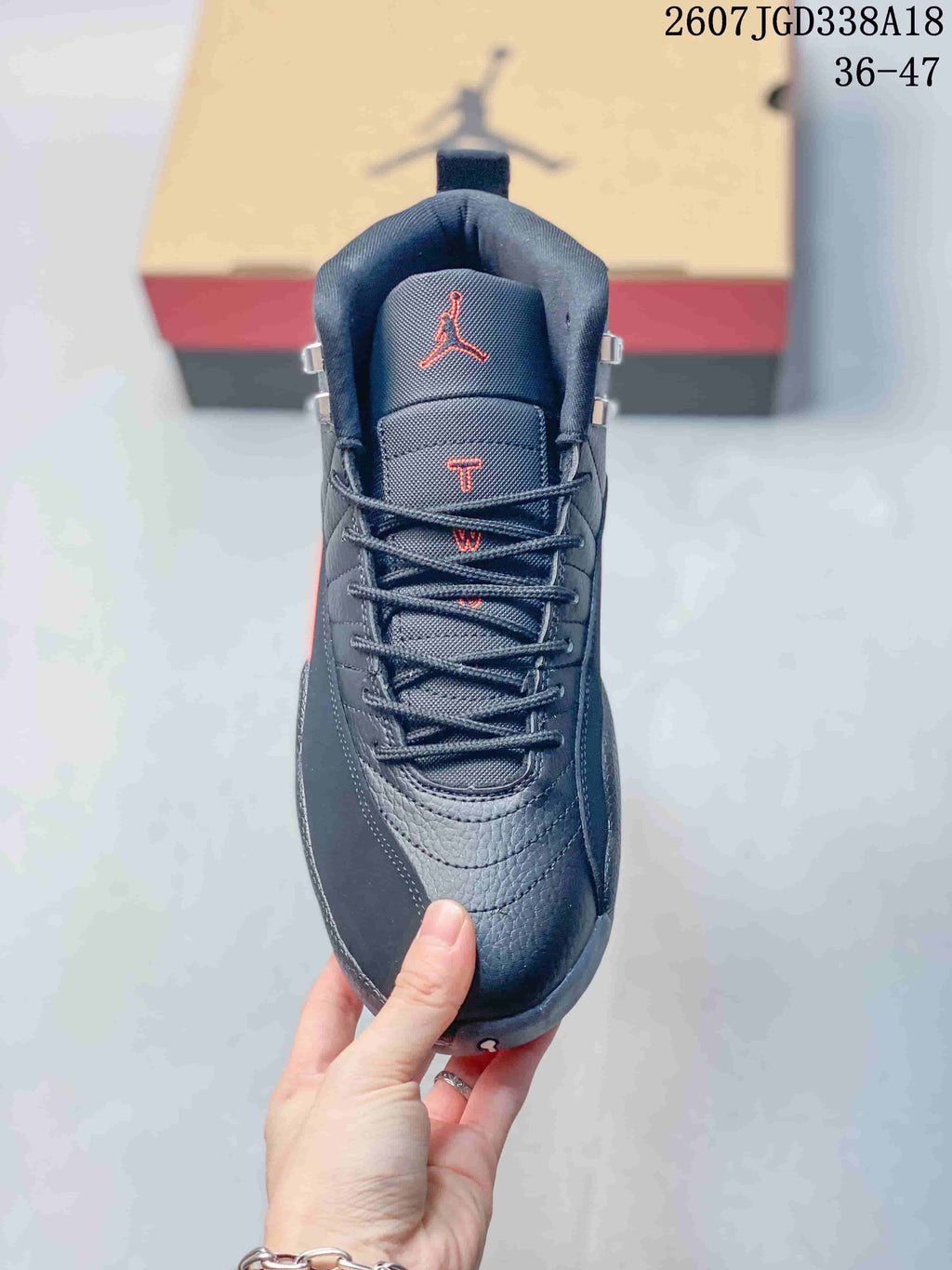 Air Jordan 12 Retro Sneakers Black Red FZ5026-100 - product image from the listing.