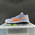 Nike Blue and Orange Speckled Trainers - product image from the listing.