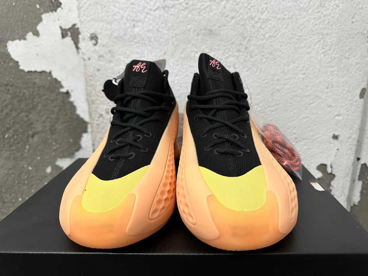 adidas Basketball Shoes in Black, Orange and Neon in Yellow - product image from the listing.