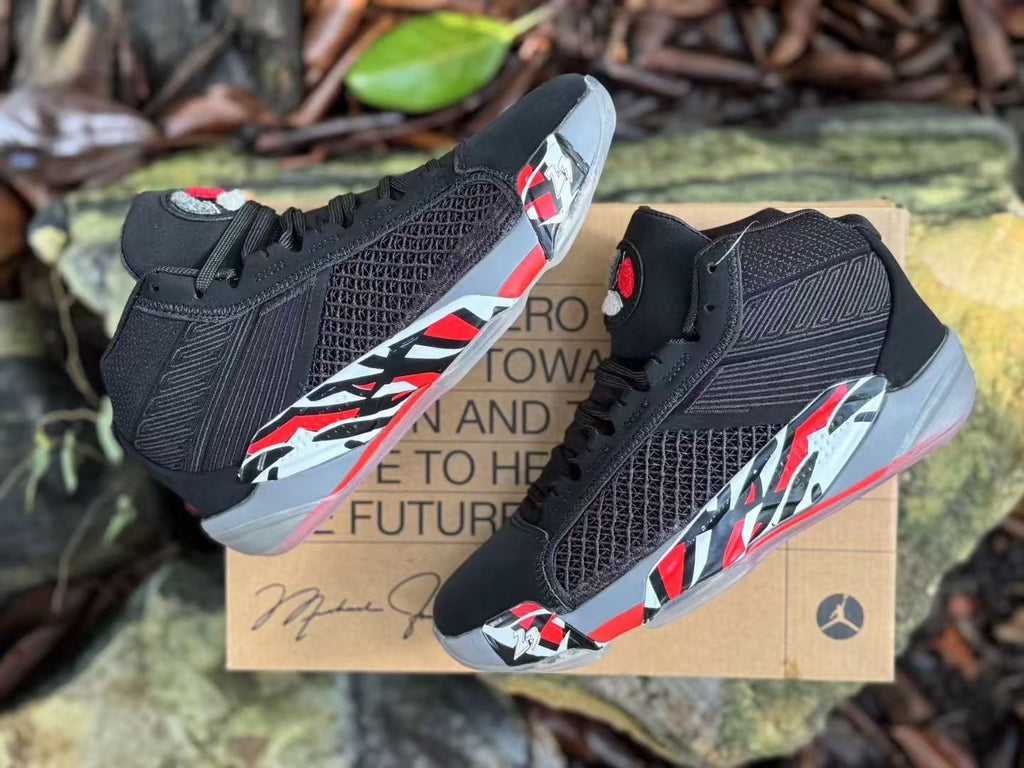 Jordan XXXVIII Playoffs 23 Basketball Shoes in Black Red - product image from the listing.
