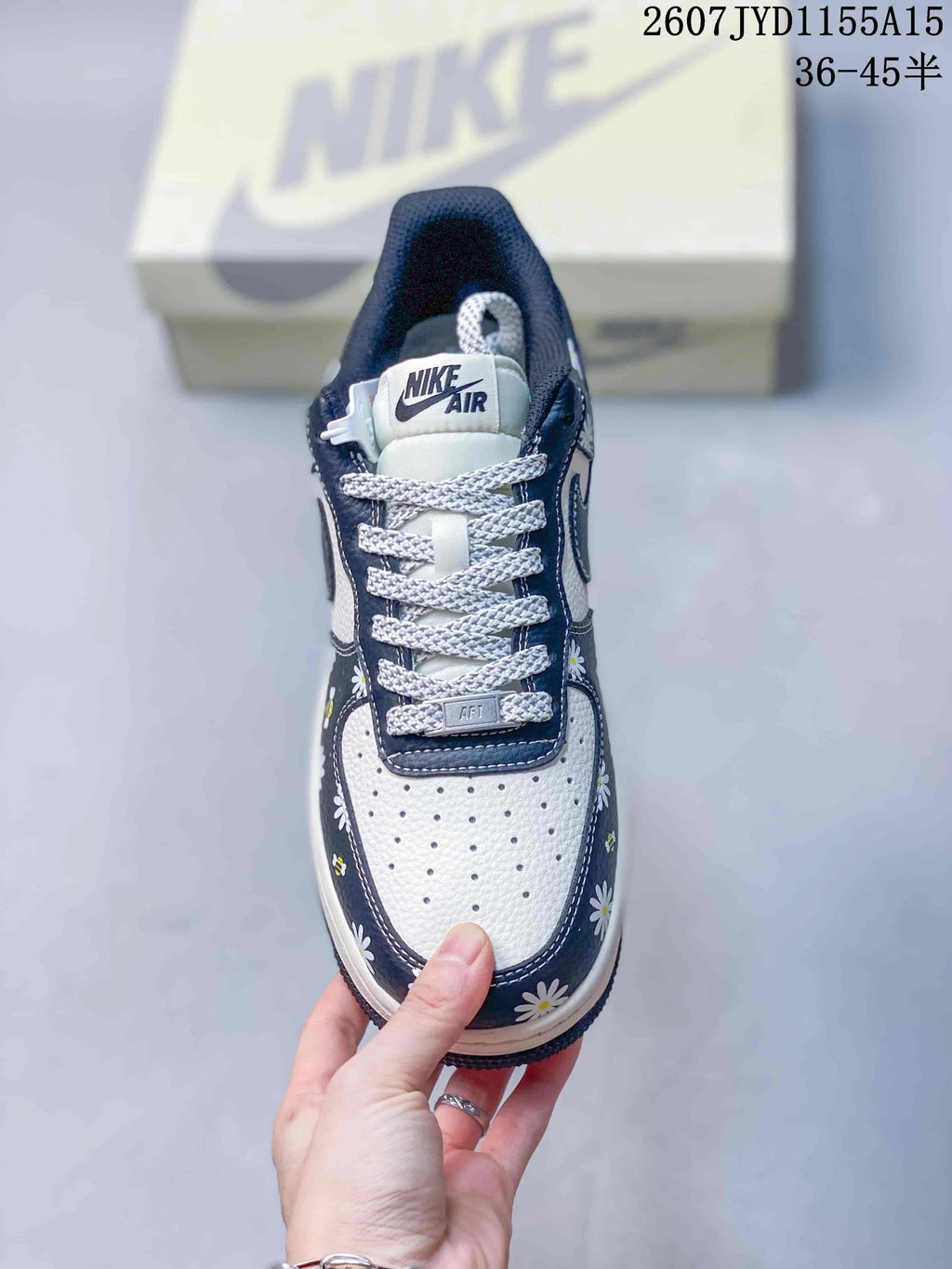 Nike Air Force 1 Low Sneakers Navy Floral in White 2607JYD1155A15 - product image from the listing.