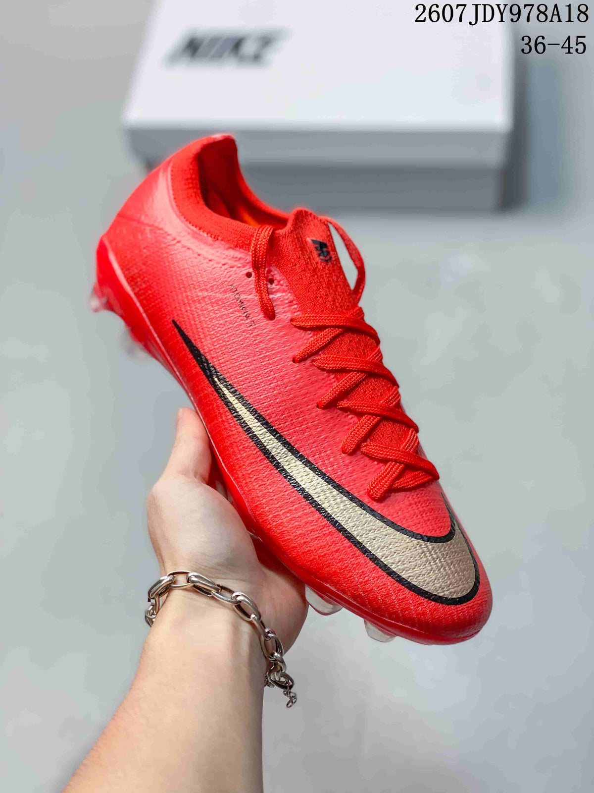 Nike Mercurial Vapor 16 Elite AG-Pro Soccer Cleats in Red - product image from the listing.
