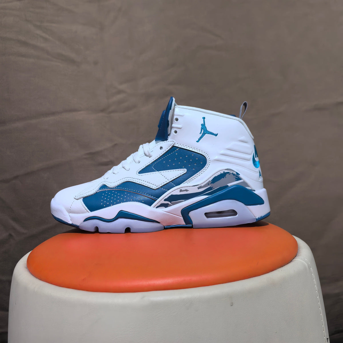 Jordan 6 Retro High-Top Sneakers in White and Blue - product image from the listing.