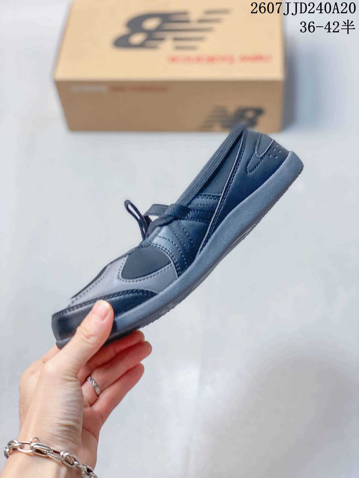 Women's New Balance Flat Breeze Black Gray Sneakers 711260QQT - product image from the listing.